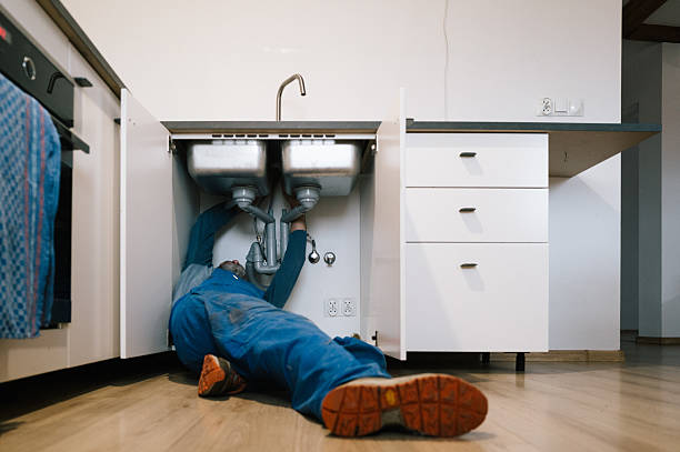 Professional Emergency Plumber technician working in Lewiston, MN